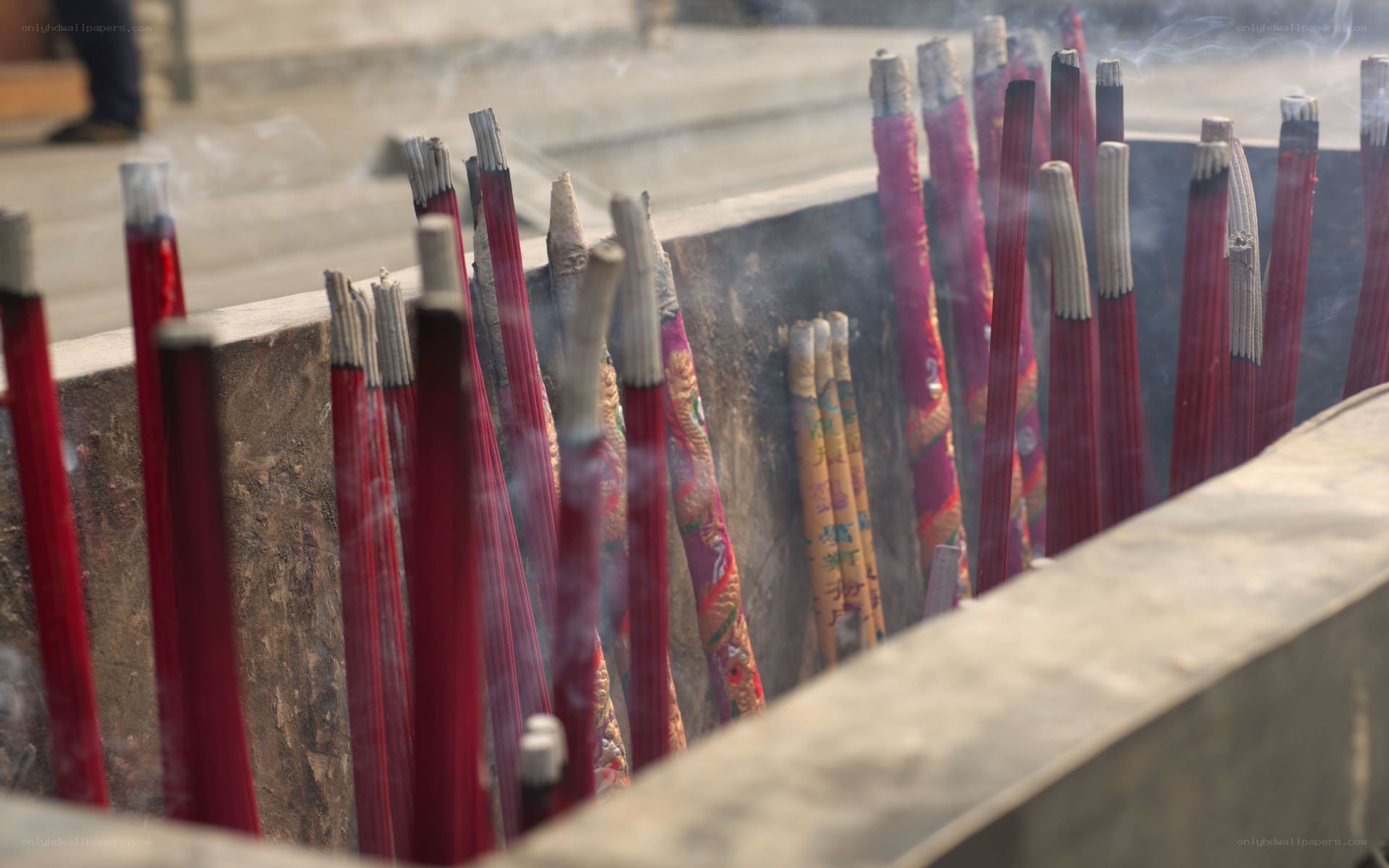 Incense sticks burning at a temple