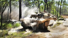 Abrams tanks shooting military