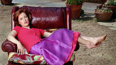 Actress Gillian Anderson skirts