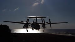 Aircraft aviation silhouettes take off aircraft carriers. AWACS