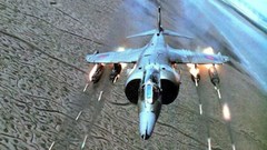 Aircraft fire rockets harrier