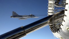 Aircraft military bomber flying Saab jets refueling 