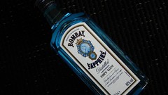 Alcohol black background gin bottles liquor bombay sapphire