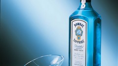 Alcohol blue background gin bottles liquor bombay sapphire