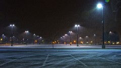 Asphalt street lights winds parking lot