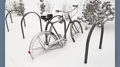 Bicycle in snow high