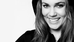 Black and white woman hoodies basketball player smiling 