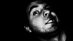 Black background faces TrenchHead Marc Theriault