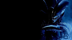black background xenomorph creature science fiction horror