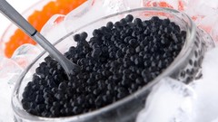 Black food caviar spoons