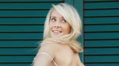 Blondes smiling models looking back undressing window blinds 