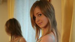 Blondes woman mirrors teen