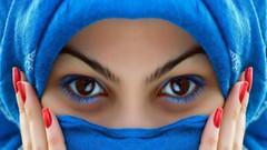 Blue eyes woman veil hidden face