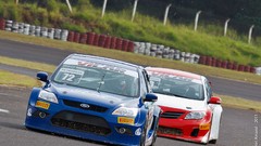 Blue red cars Ford races ford focus race tracks Toyota Camry