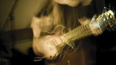 Blurred guitarists