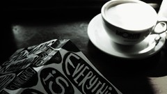 Books milk Everything Is Illuminated cups grayscale