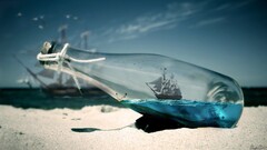 bottles ship beach sand depth of field Photo manipulation water