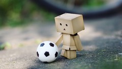 Boy yellow danboard tilt-shift