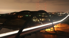 Bridges buildings light trails