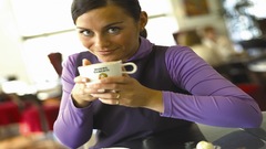 Brunette smile drinking coffee