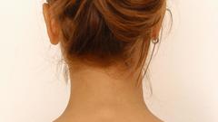 Brunettes neck hair bun