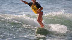 Brunettes woman bikini surfing