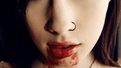 Brunettes woman blood pierced