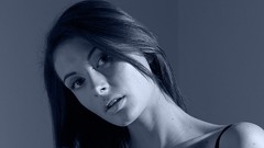 Brunettes woman close-up blue