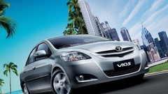 Cars Philippines roads palm trees Toyota buildings 2009 