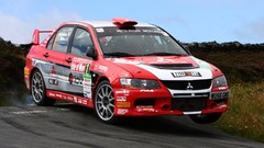 Cars rally racing Mitsubishi Lancer Evolution IX