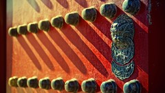 China close-up architecture shadows gates carving gateway