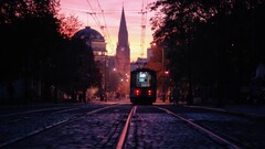cityscape Poland Poznan Church tram City street university dusk
