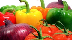 Close-up vegetables tomatoes onions peppers