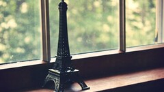 closeup window eiffel tower replica indoors