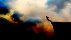 Clouds falling down cliffs