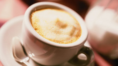 Coffee cups spoons cream