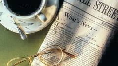 Coffee glasses newspapers