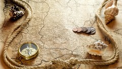Coins Maps compasses seashells