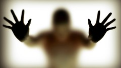 Dark hands shadows out of focus