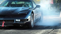 Drag racing vehicles woman