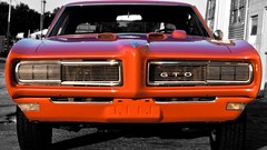 Engine red orange cars hood close-up Pontiac classic front 