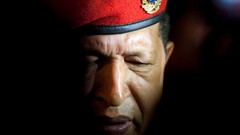 Faces hugo chavez