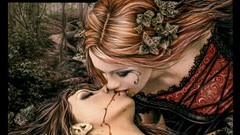 Fantasy dark woman kissing Victoria Frances