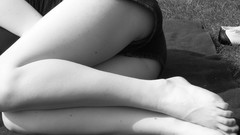 Feet woman Shorts monochrome legs sunbathing
