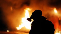 Fire explosions Rebels Rebel gas masks riots