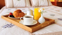 Flowers tea Breakfast strawberries croissants orange juice