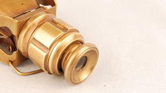 Folding pocket opera glass