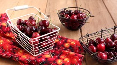 Food cherries baskets napkins wooden floor food art