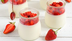 Food glasses cream dessert strawberries spoons panna cotta
