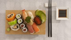 Food sushi shrimp sauce rice chopsticks